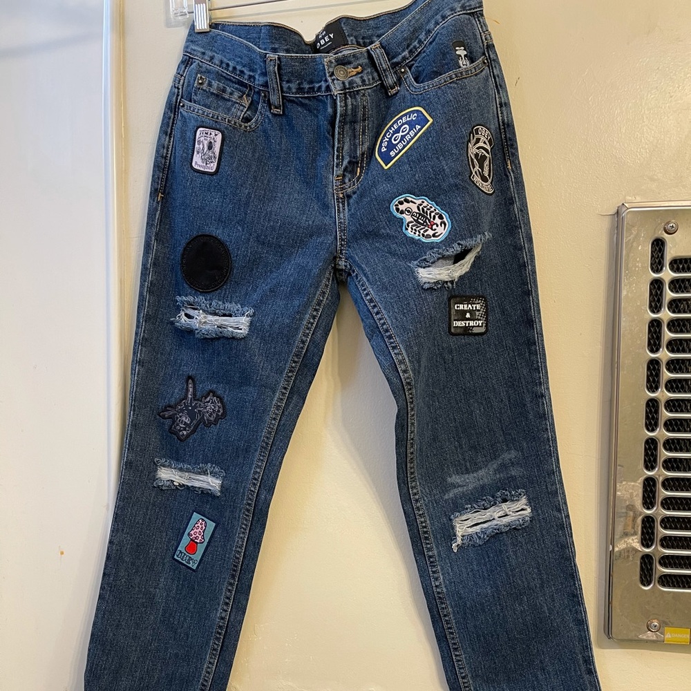 Obey propaganda jeans with patched work